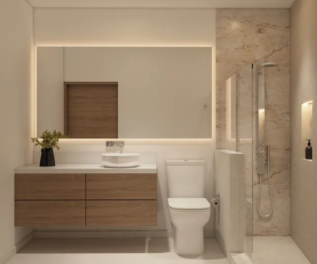 Main bathroom with marble shower and wood vanity in a Vista Los Sueños condominium