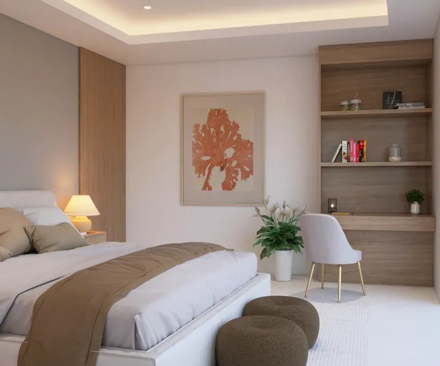 Master bedroom with bookshelf and workspace in a Vista Los Sueños condominium